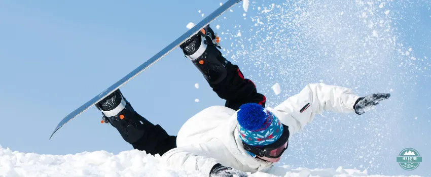 NDL - A man tumbling while snowboarding
