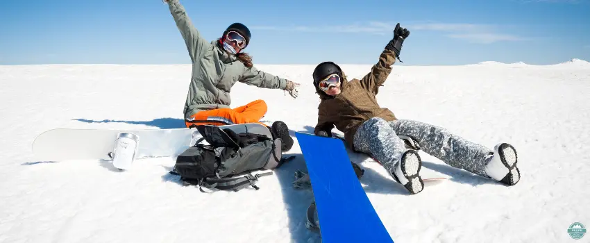 NDL-Two snowboarders sitting on the snow