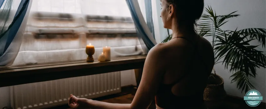 NDL - Woman meditating indoors