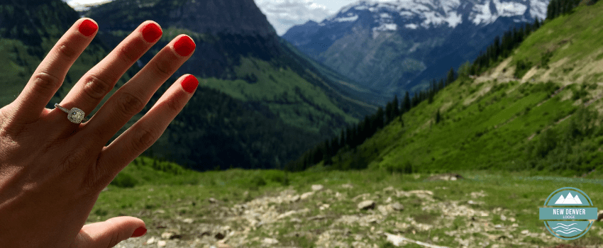 NDL - Woman wearing engagement ring with mountain background